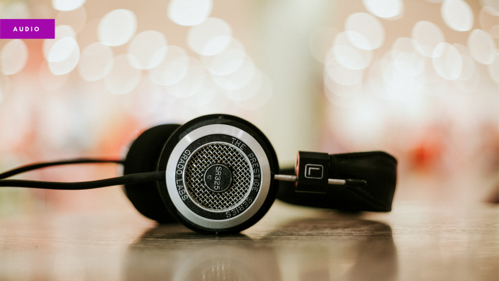 Blog header showing a pair of professional headphones on a blurry background