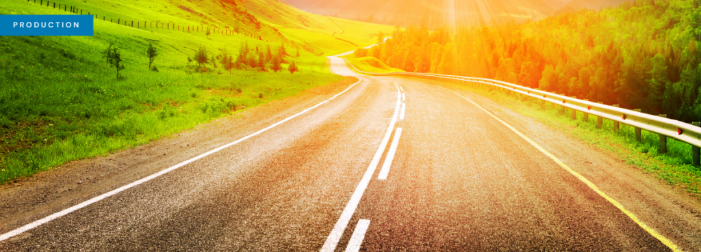 Header image showing a mountain road stretching into the distance